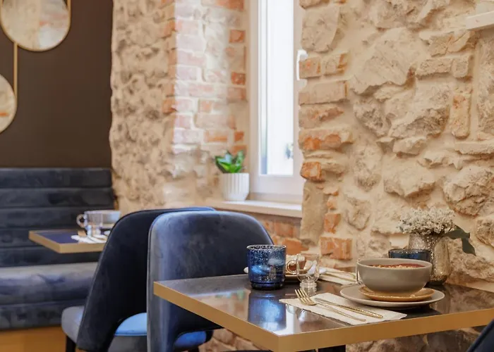 לינה וארוחת בוקר Heritage Olympic Dream 3*